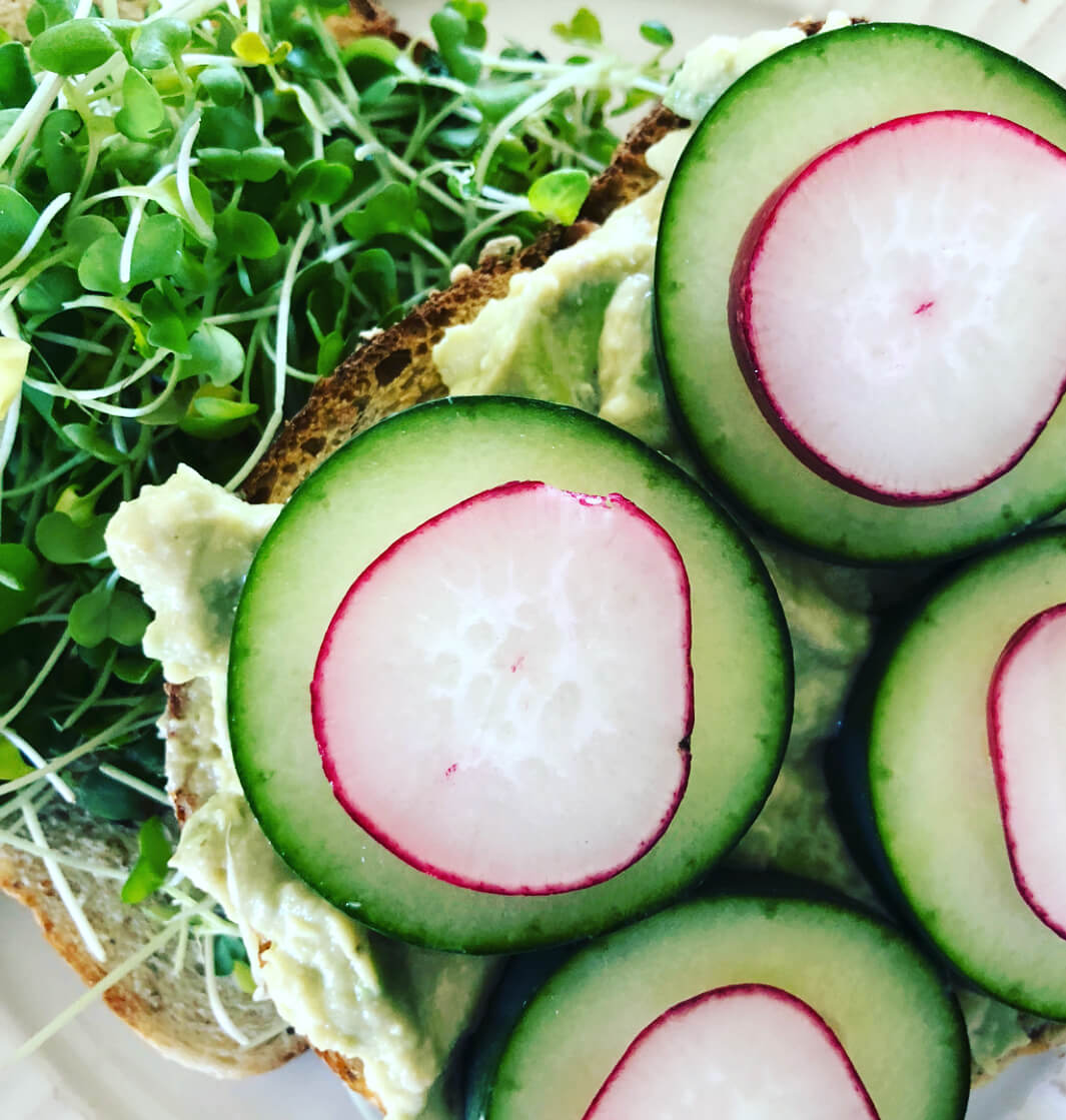 Healthy Sandwich with Avocoado and Hummus, Radish, Microgreens